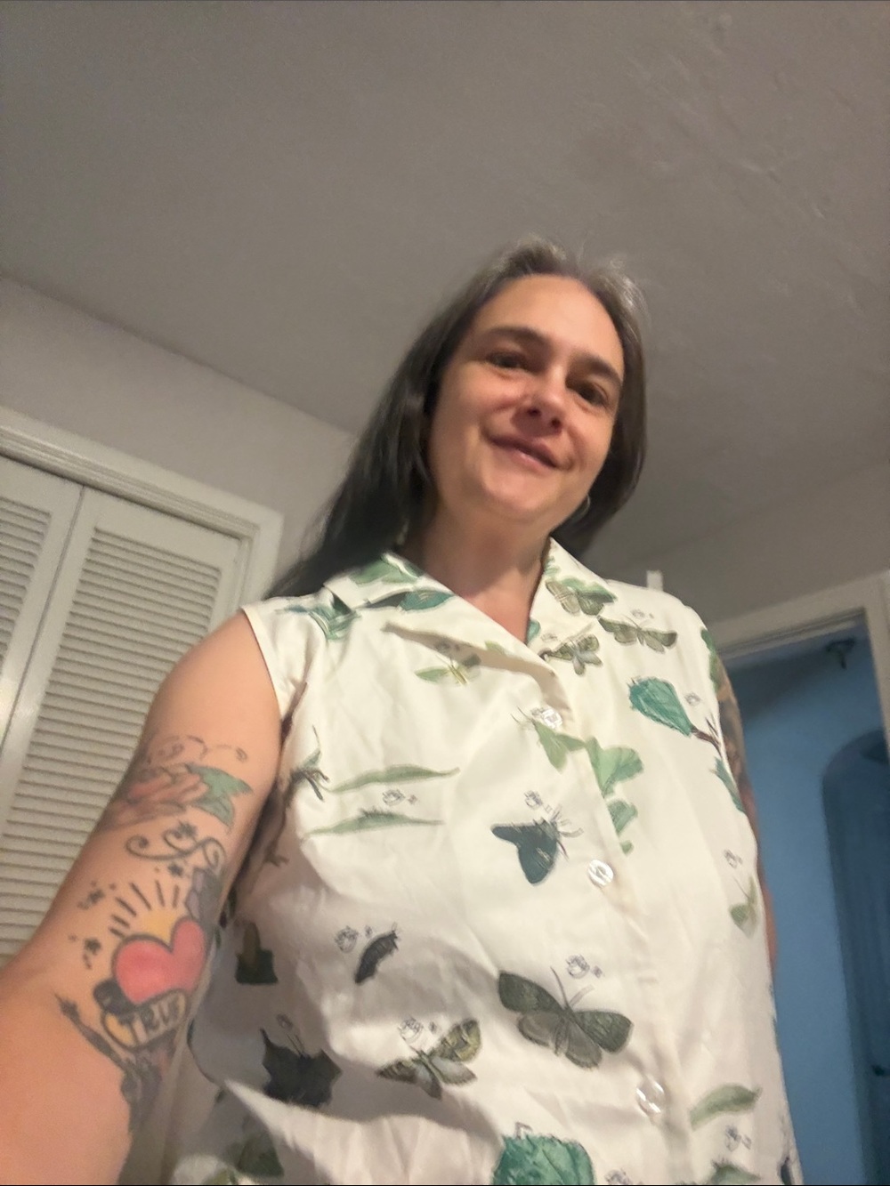 White Sleeveless Button-Up Top with Green Butterfly Print
